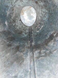 Dryer vent cap and screws coated in dust before cleaning in Sugar Land, TX 77498